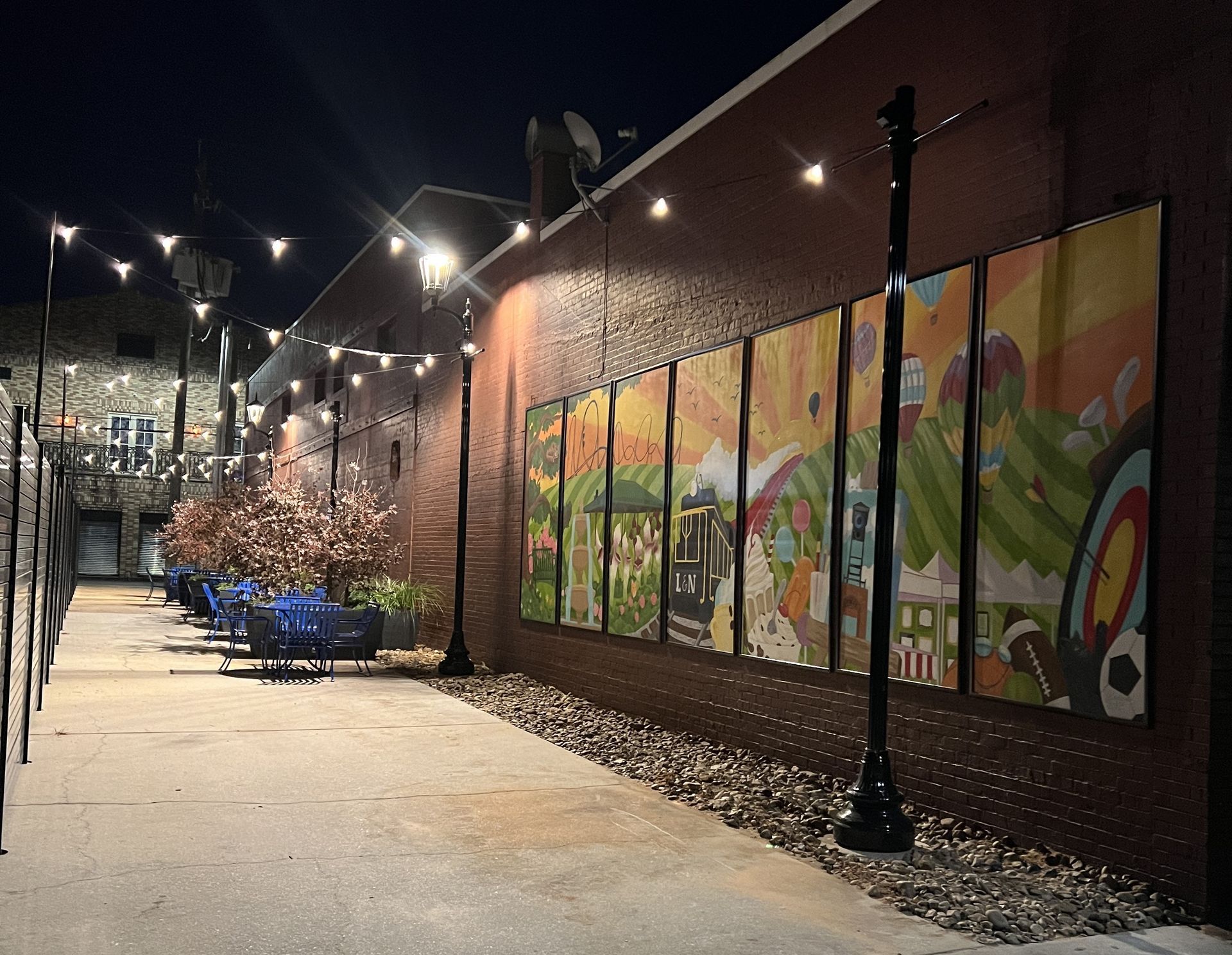 Lights shine over the new walkway on Cat Alley. The walkway will be dedicated on Thursday during the downtown Third Thursday event.