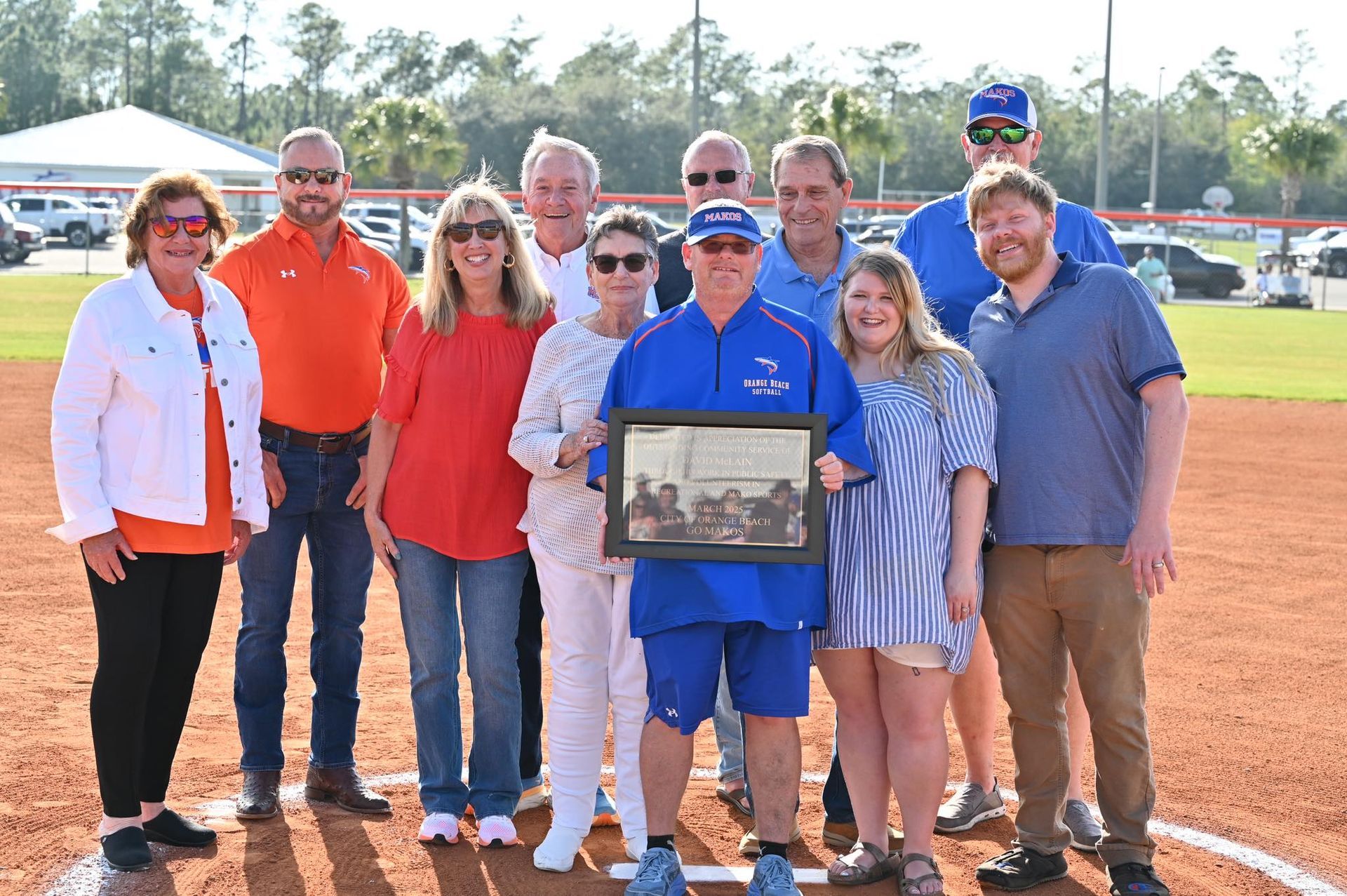 Orange Beach Honors Longtime Coach David McLain at During Opening Day Celebrations