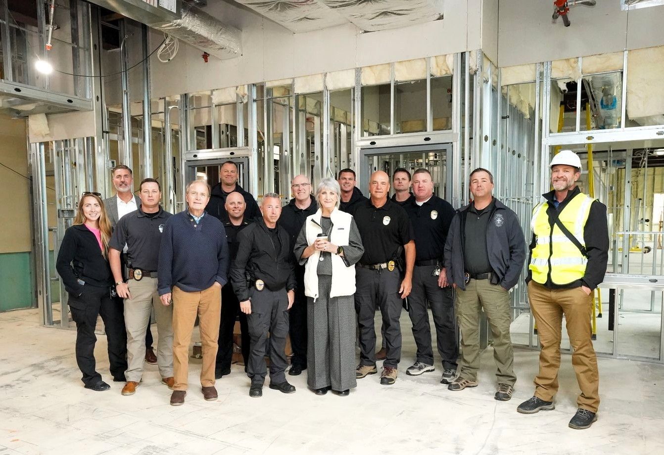 Mayor Robert Craft and city officials inspect construction progress at the former Sacred Heart Medical Office Building location