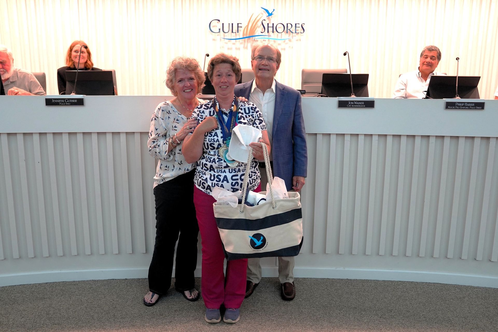 Leigh Anne Landrum Special Olympian with her Mom, Tracy and Mayor Craft