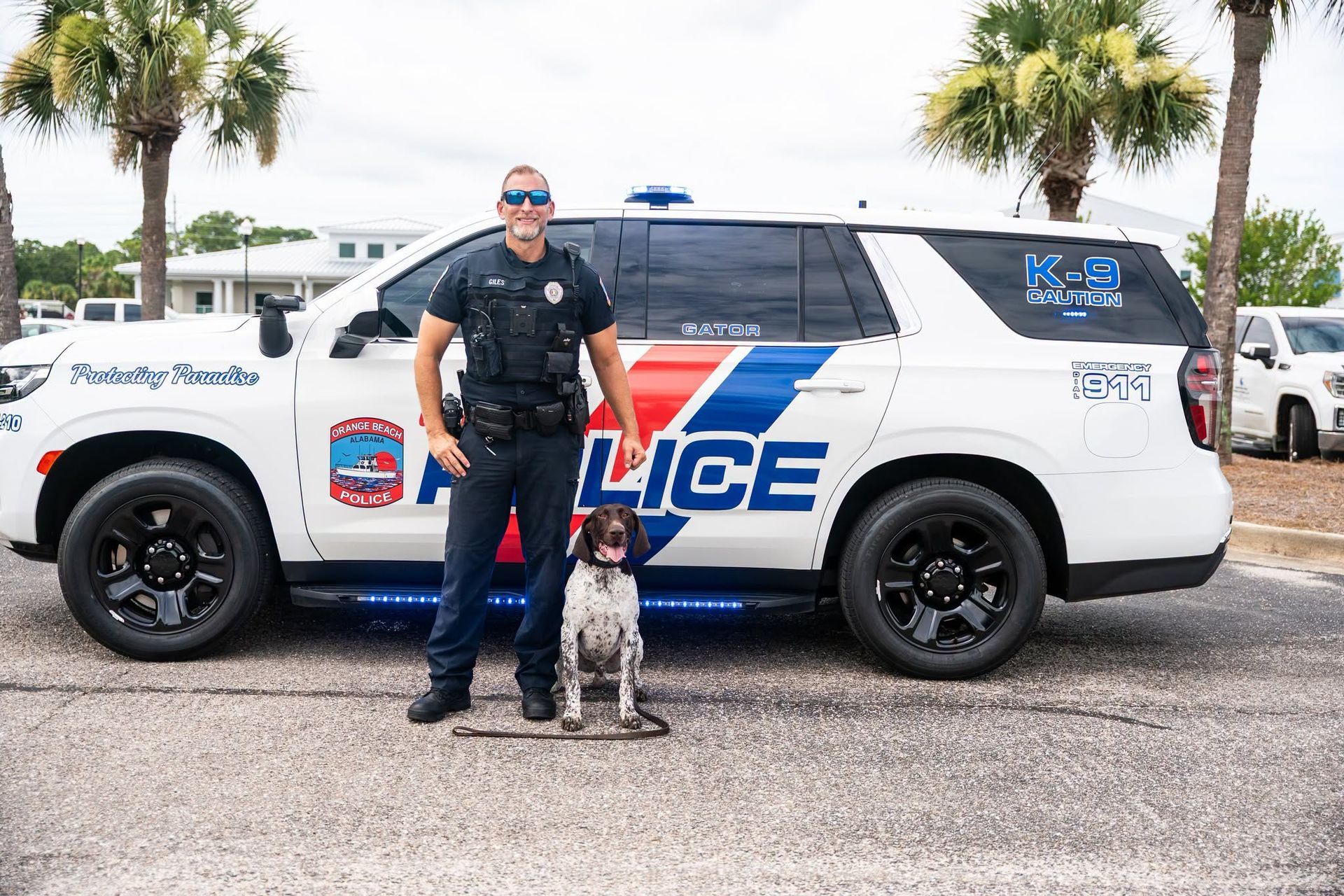 Officer Brennan Giles with K9 Gator