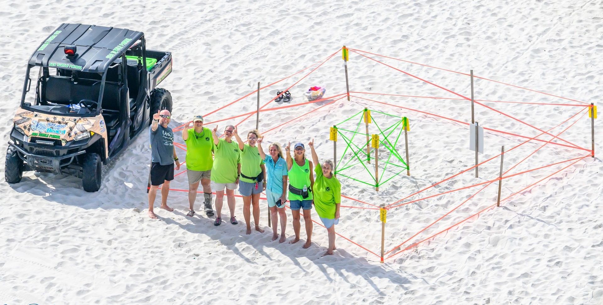 Orange Beach Sea Turtle Team with the first nest of the 2024 Season - Photo by Brent Williams, Wolf Bay Media