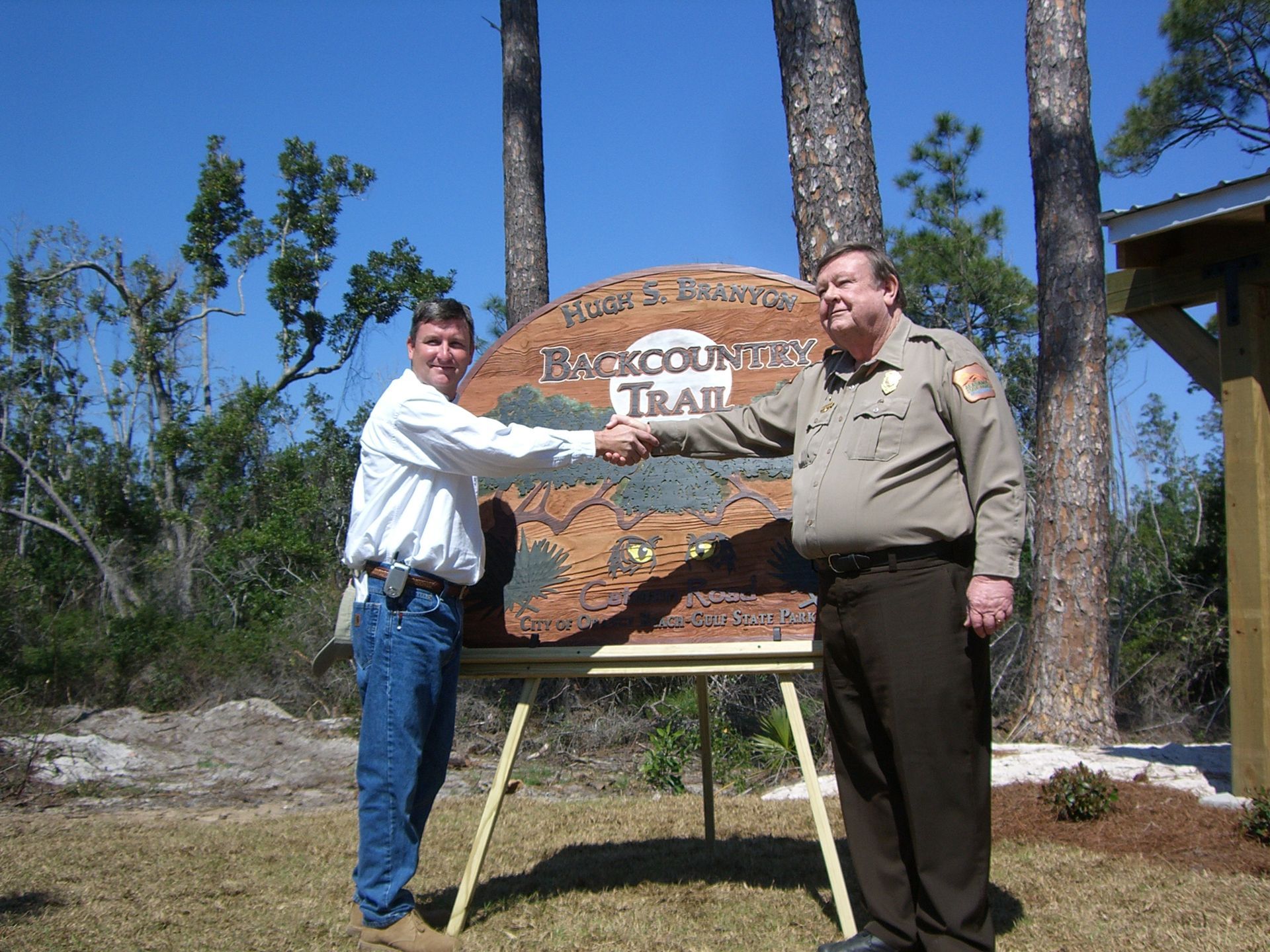 Orange Beach Environmental Planner, Phillip West and Gulf State Park Superintendent Hugh S. Branyon at Trail dedication March 9, 2007.