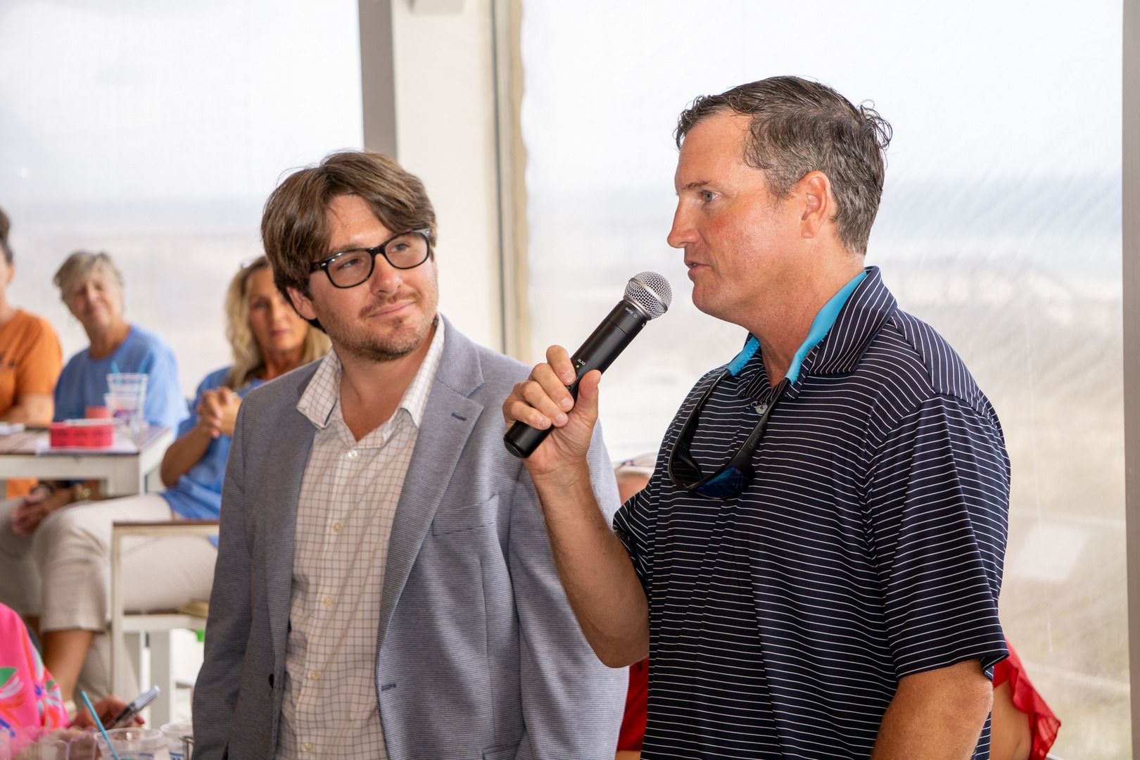 Mitchel Lee with Lee Charities and John McInnis with Flora/Bama/CoastAL Restaurant