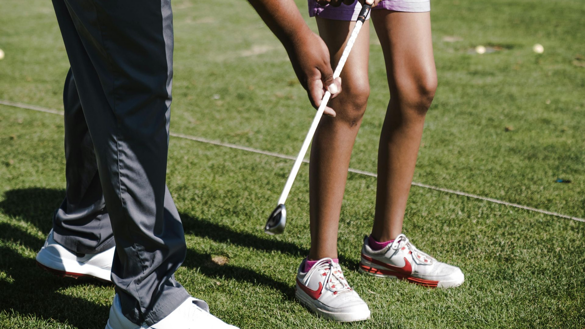 Youth Golf Instruction - Stock Image