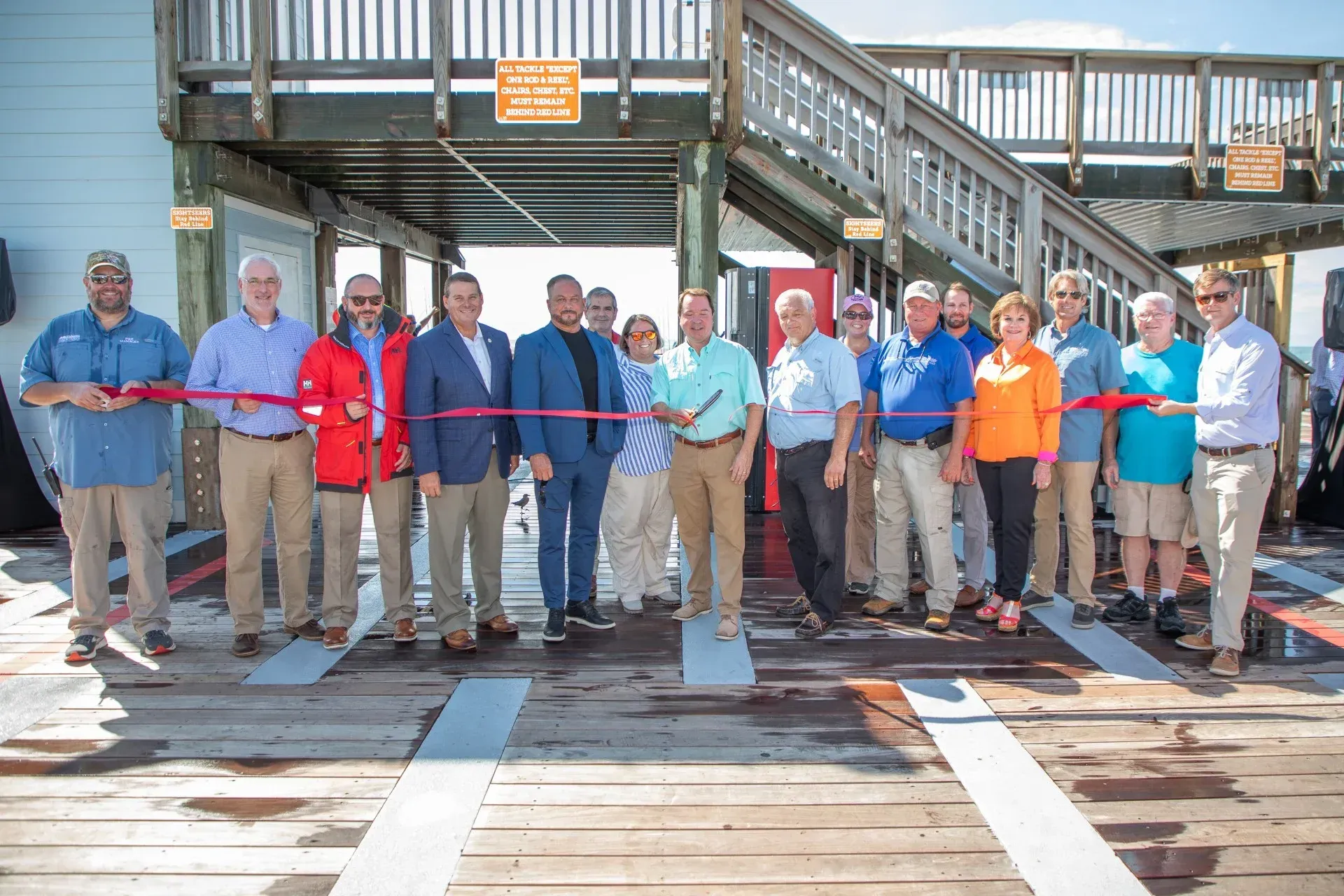 Alabama State Parks Director Greg Lein cuts the ceremonial ribbon officially reopening Gulf State Park Pier - Photo by Billy Pope, ADCNR

