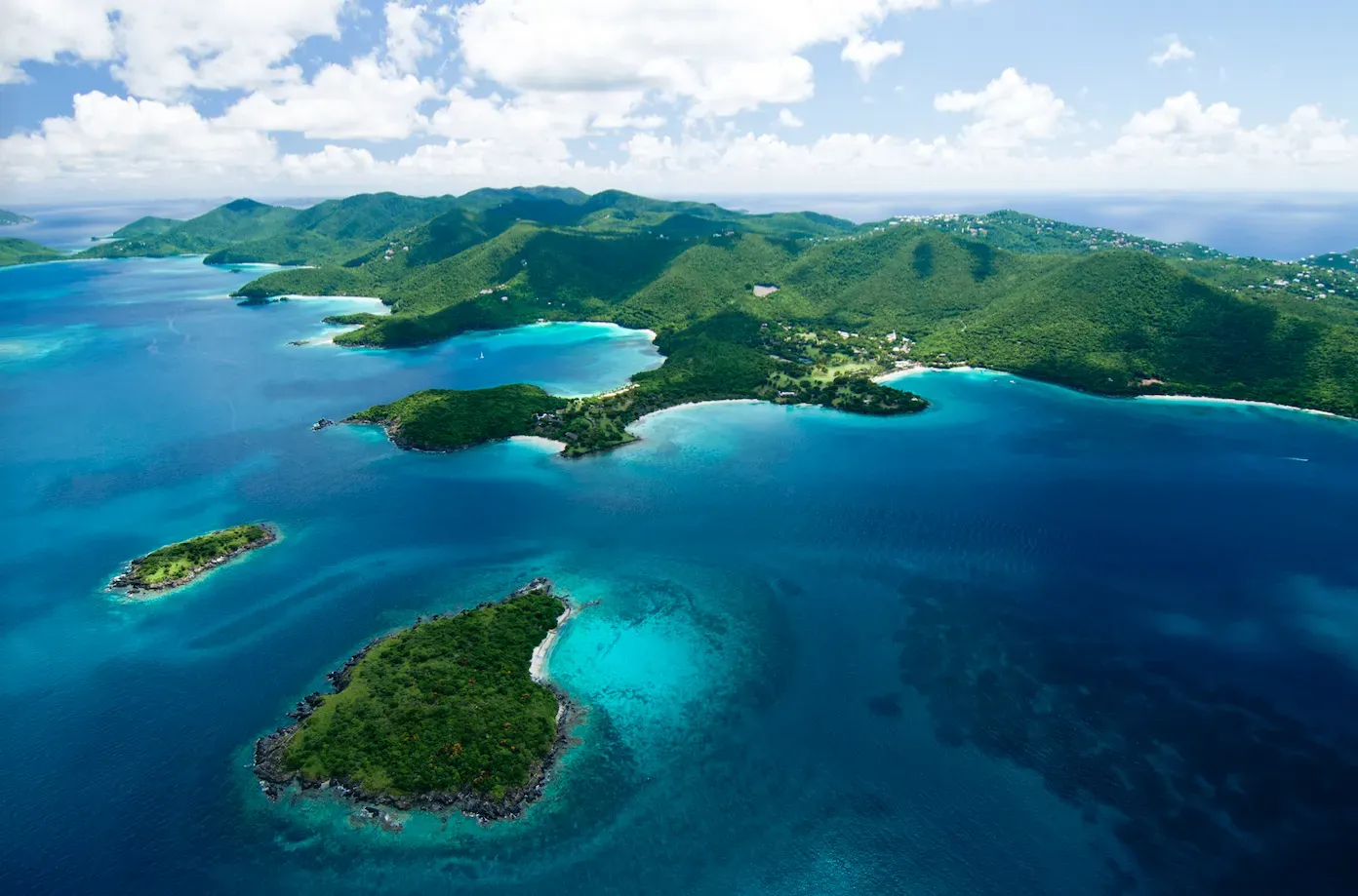 An aerial view of a group of islands in the ocean