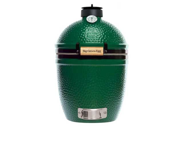 A large green egg with a black lid on a white background.
