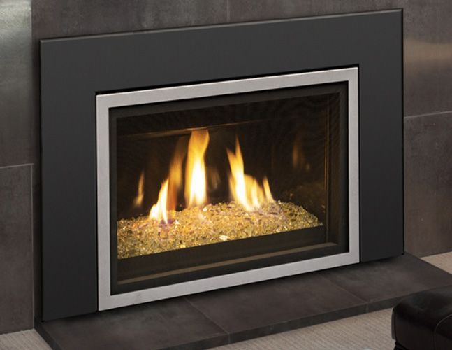 A fireplace with a black frame and a silver trim