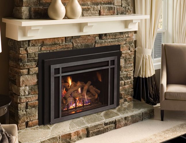 A living room with a fireplace and a chair.