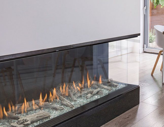 There is a fireplace in the middle of the room.