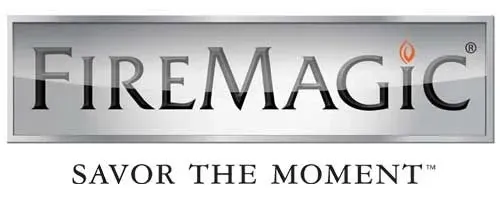 A silver sign that says firemagic savor the moment