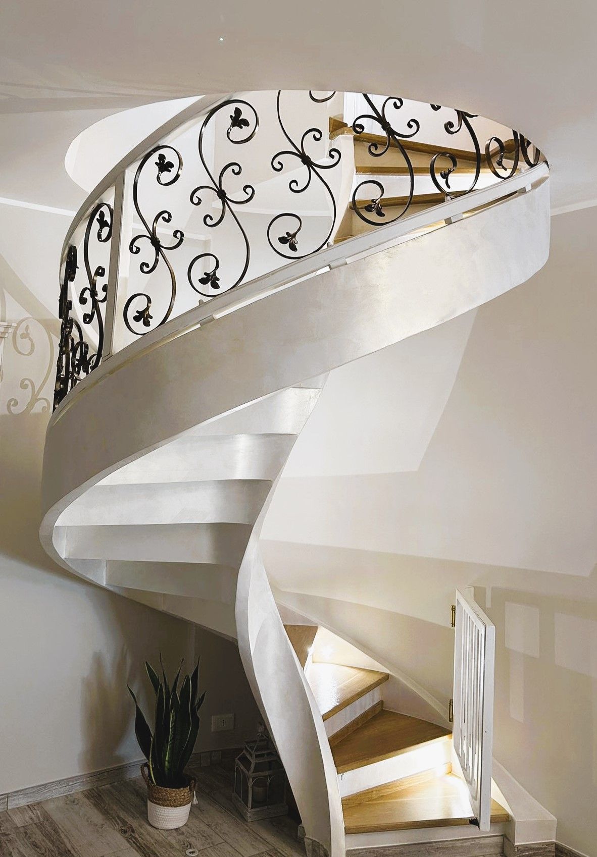 Metal railing concrete helical stairs in San Mauro di Saline