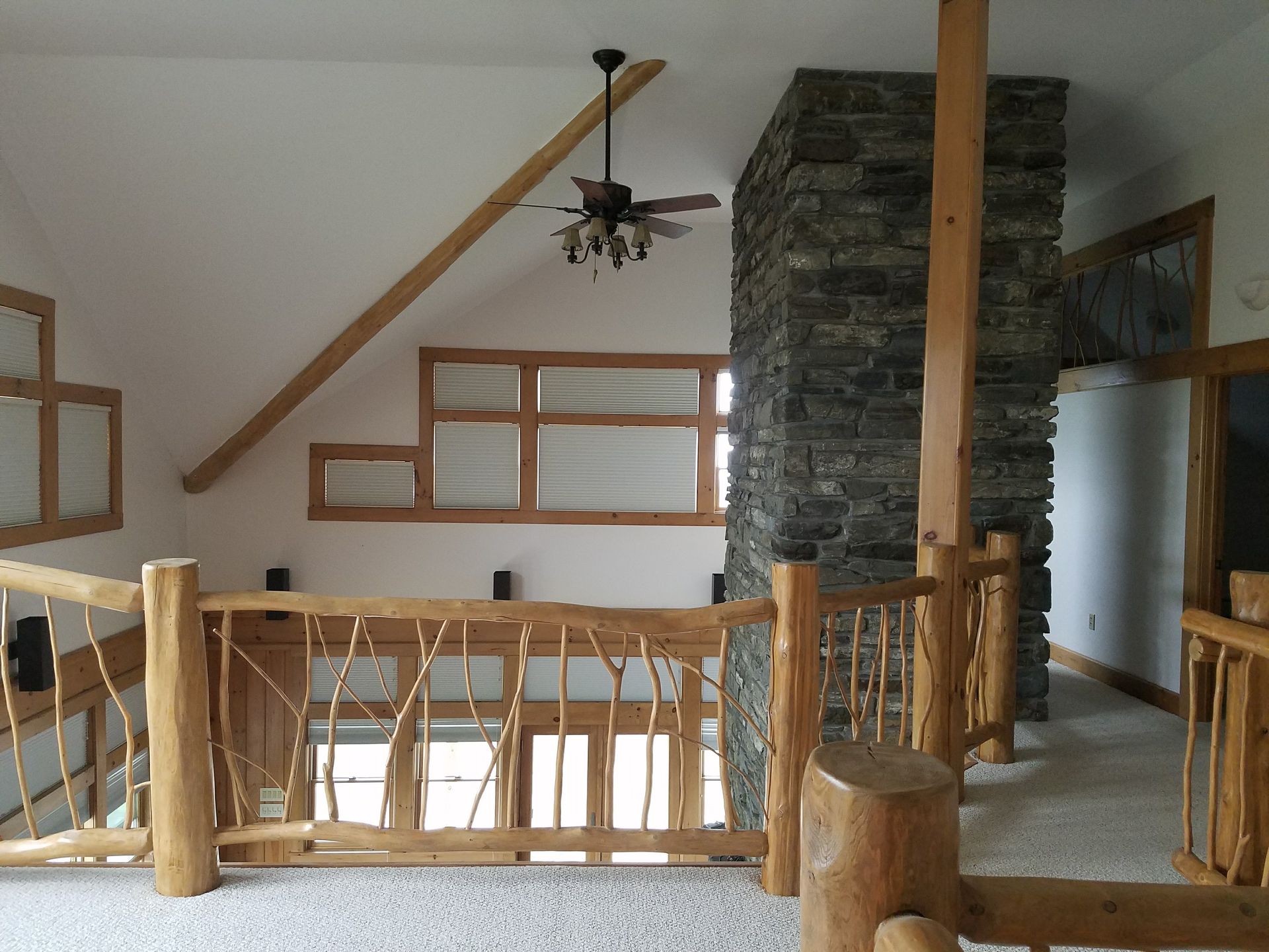 Custom Stairs, Railings, & Fireplaces By Big Tree Log Homes