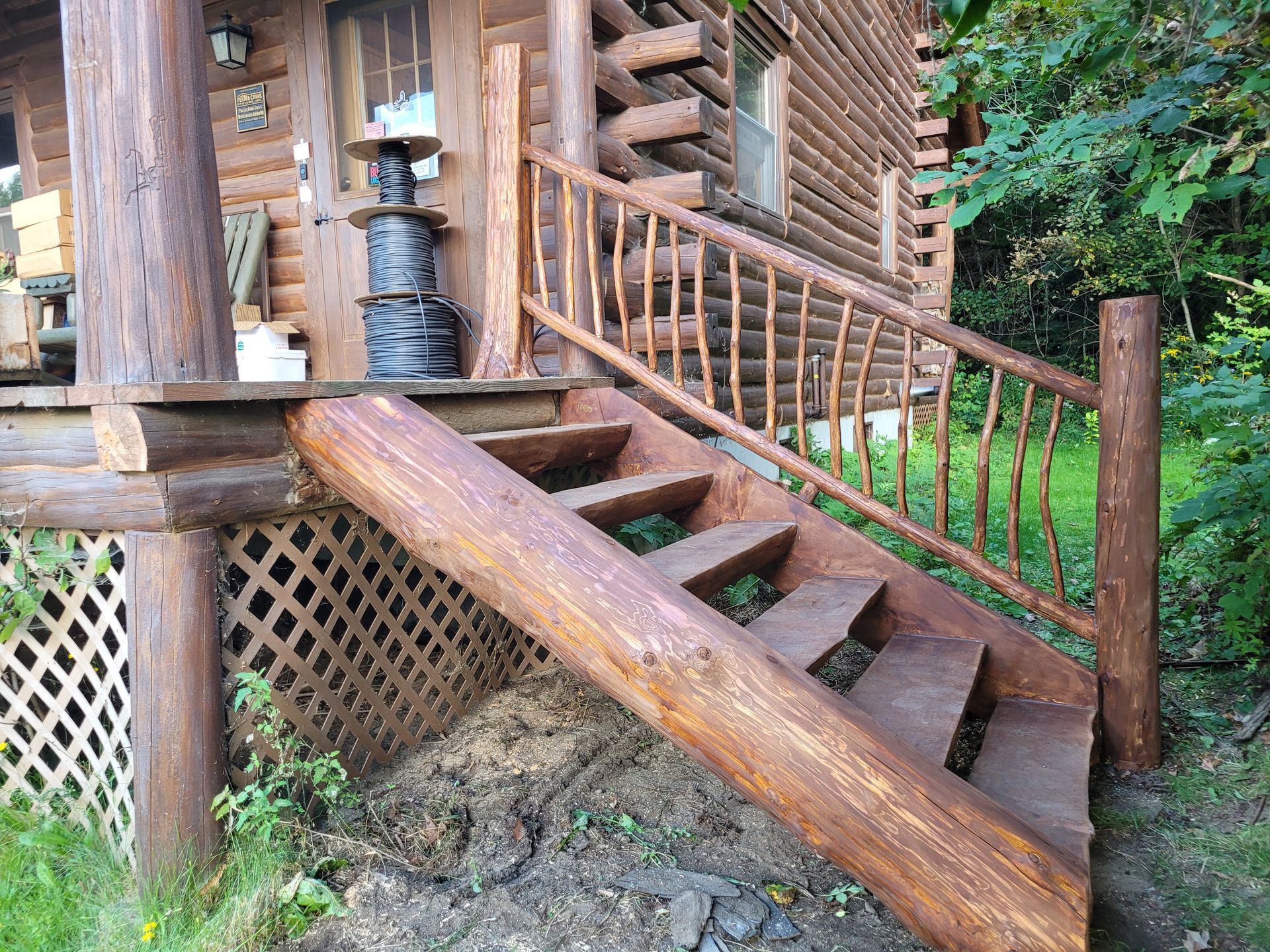 Custom Log Stairs Built  By Big Tree Log Homes