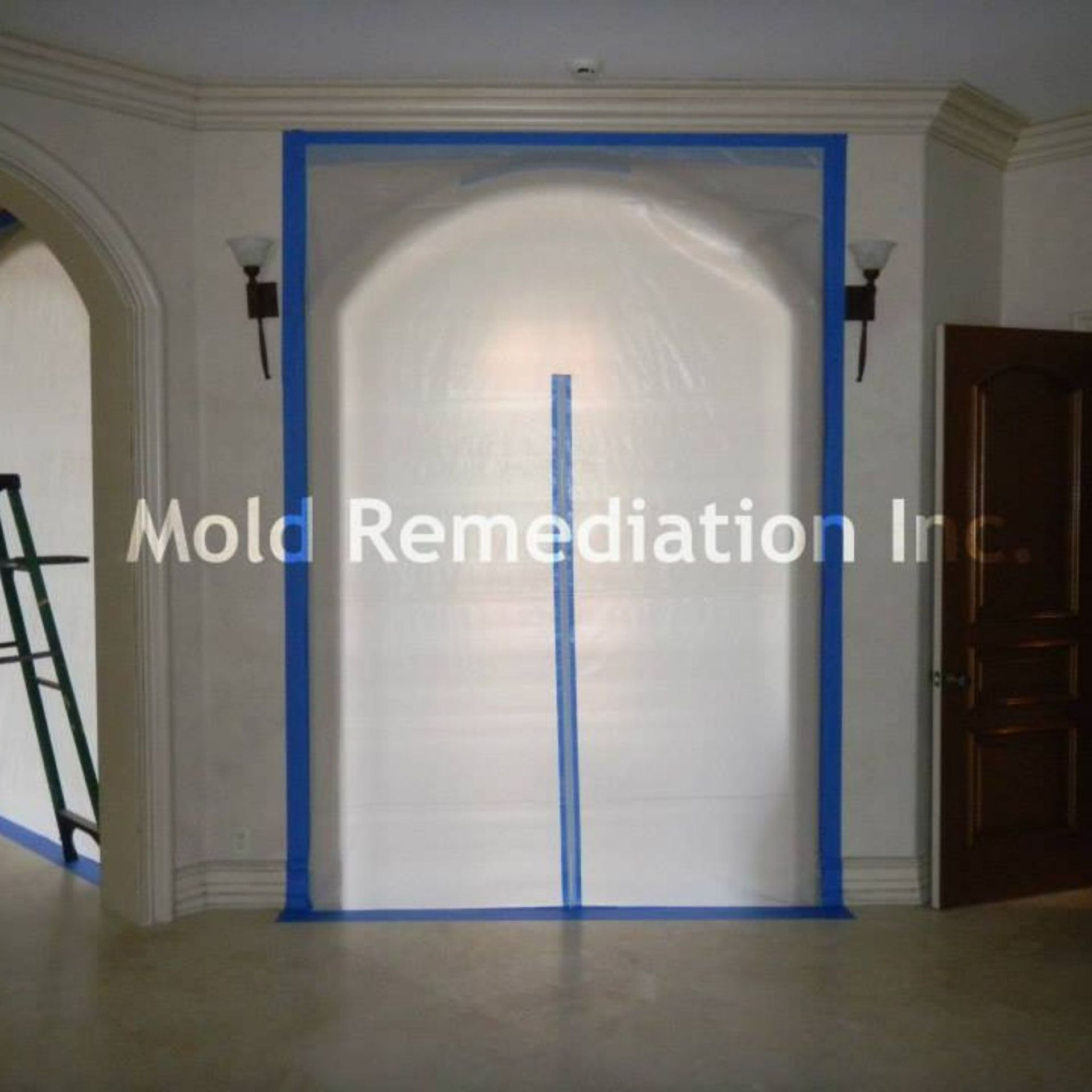 Mold Remediation Inc -A room with mold remediation inc. written on the wall