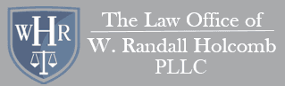Logo for The Law Office of W. Randall Holcomb PLLC, featuring a shield with 
