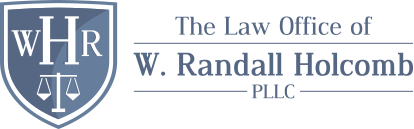 Logo for The Law Office of W. Randall Holcomb, PLLC. Shield with 