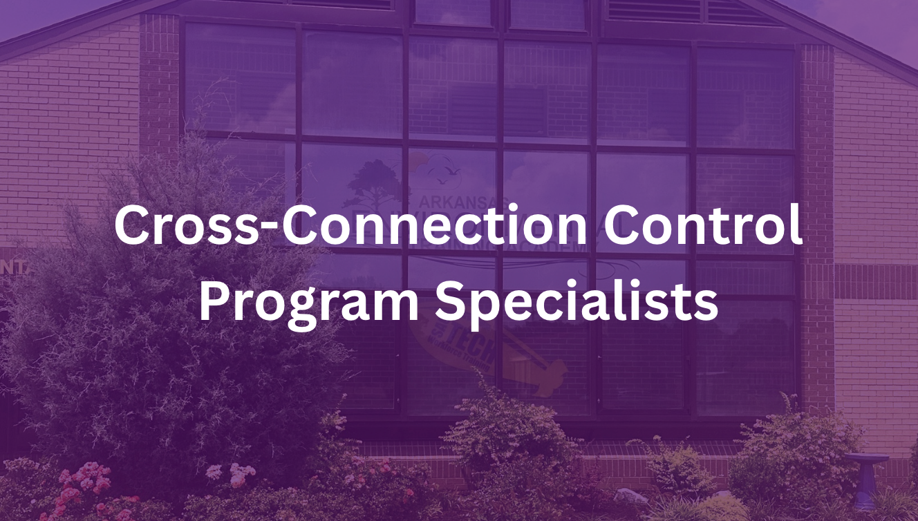 Purple-tinted building facade with white text reading “Cross Connection Control Program Specialist”