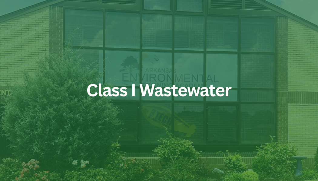 Green-tinted building exterior with centered text “Class I Wastewater”