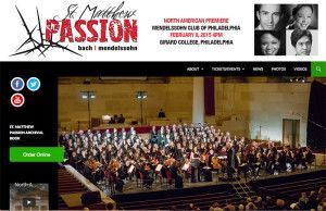 A large orchestra is playing in a large auditorium.