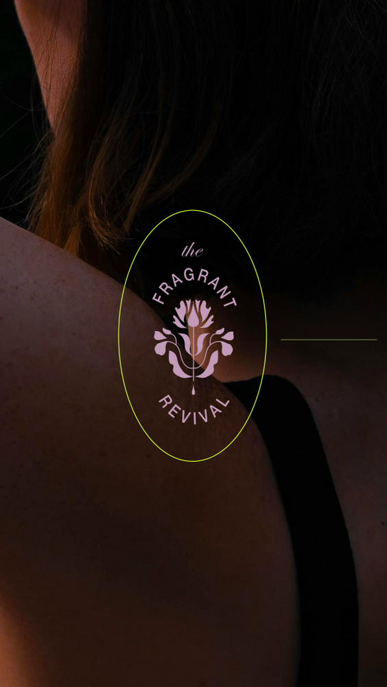Logo on woman's shoulder, oval with floral design,