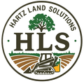 Hartz Land Solutions logo with green tree, HLS letters, and skid steer on fields