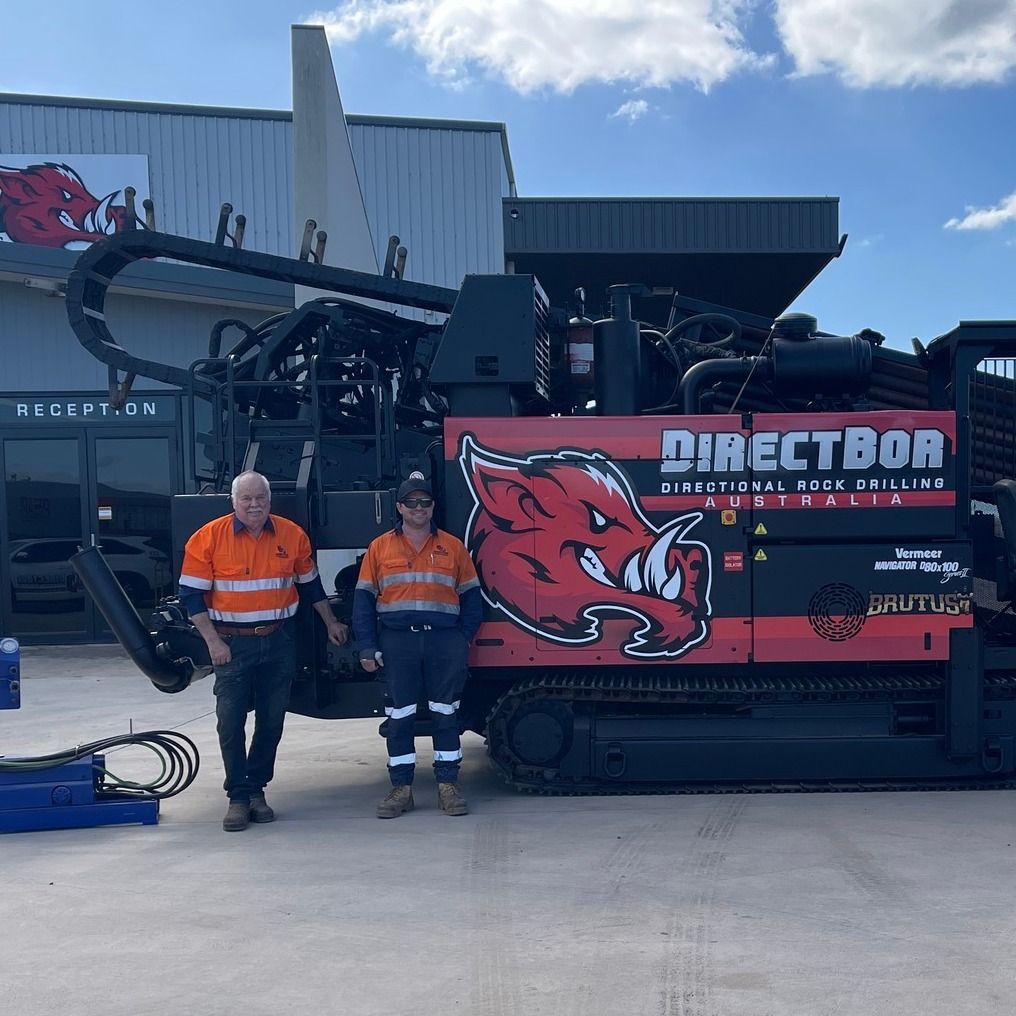 Two Men Stand In Front Of A Directbor Directional Rock Drilling Machine - Geelong, VIC - Directbor Two Men Stand In Front Of A Directbor Directional Rock Drilling Machine - Geelong, VIC - Directbor
