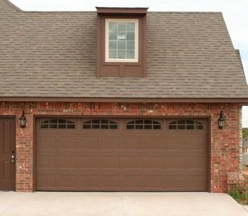 Brown garage door installation.