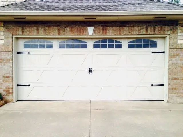 A white garage door. A white garage door.