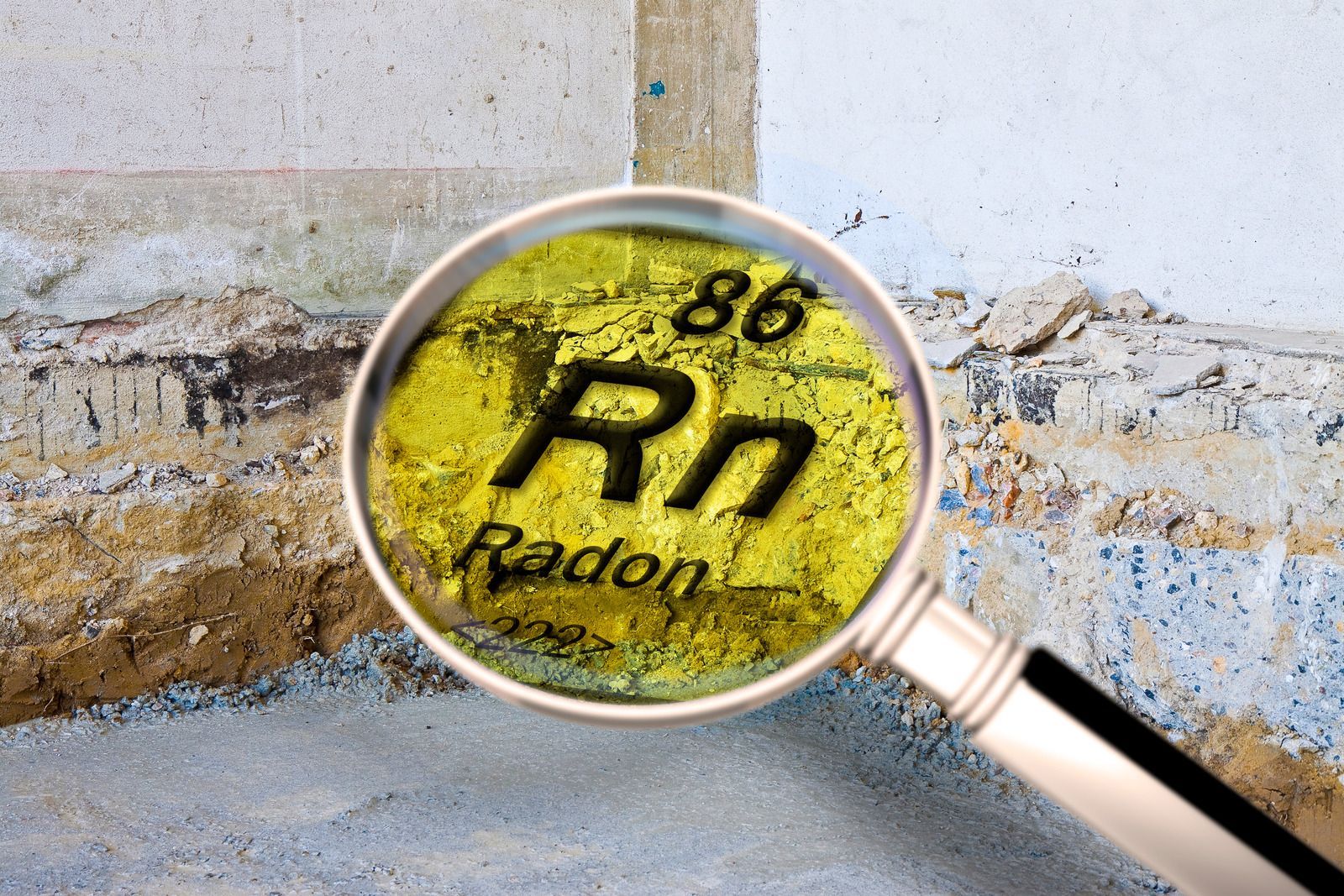A magnifying glass shows the chemical symbol for radon