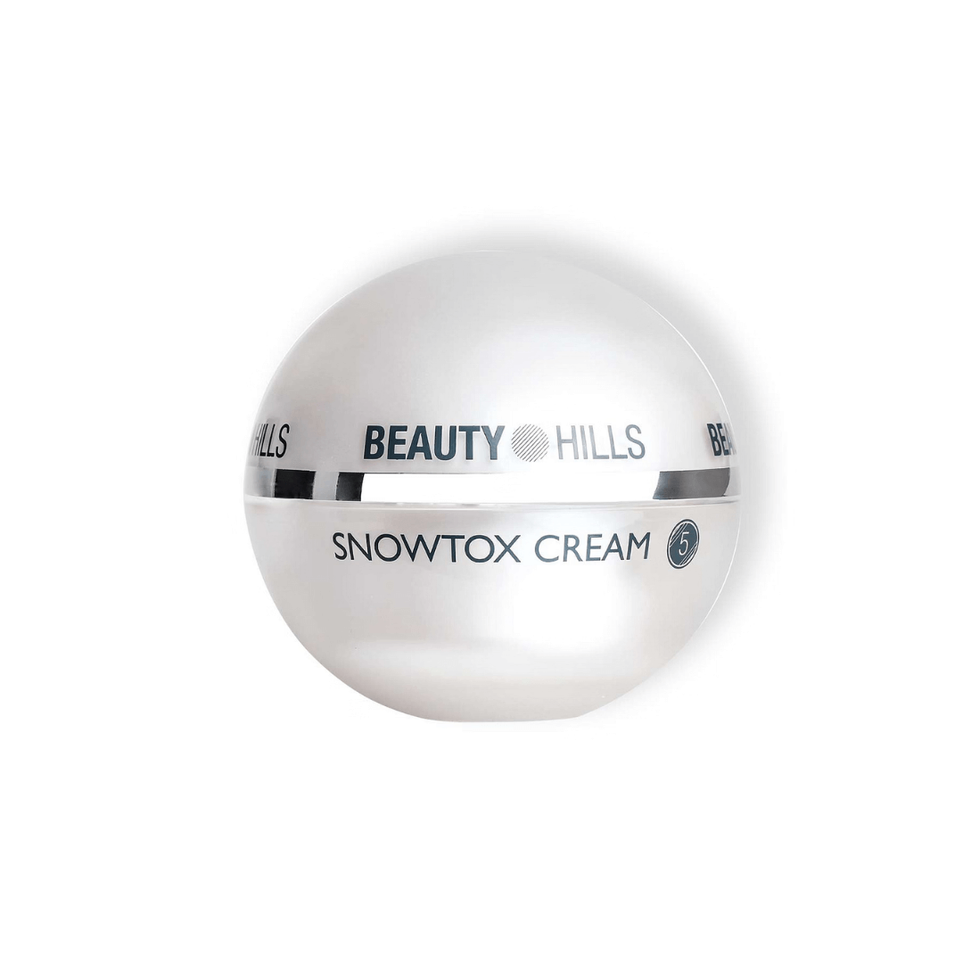 Una pallina bianca con sopra la scritta Beauty Hills Snowtox Cream.