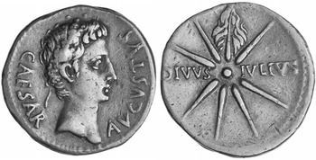 Ancient Roman silver coin with bust of Julius Caesar on one side and a starburst design with letters on the other.