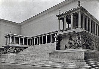 Reconstruction of Pergamon Altar, ancient Greek structure with detailed relief carvings and colonnades.