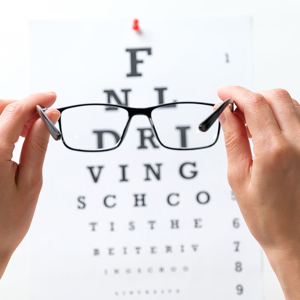 Person is Holding a Glasses in Front of an Eye Chart – Mary Esther, FL – Primary Eye Care Center Person is Holding a Glasses in Front of an Eye Chart – Mary Esther, FL – Primary Eye Care Center