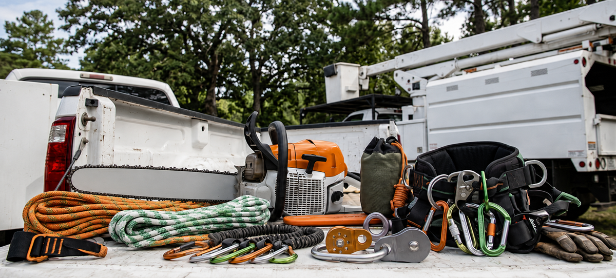 Bucket truck used for high branch trimming near residential home