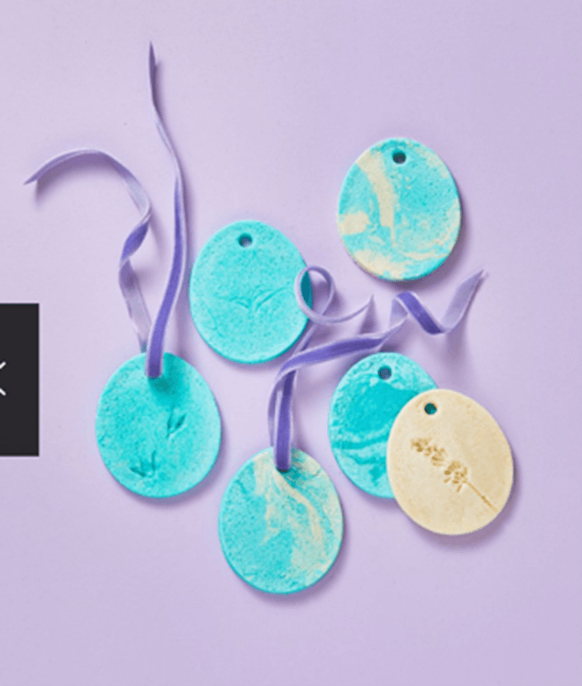 Purple background with colorful Salt Dough Flower Eggs