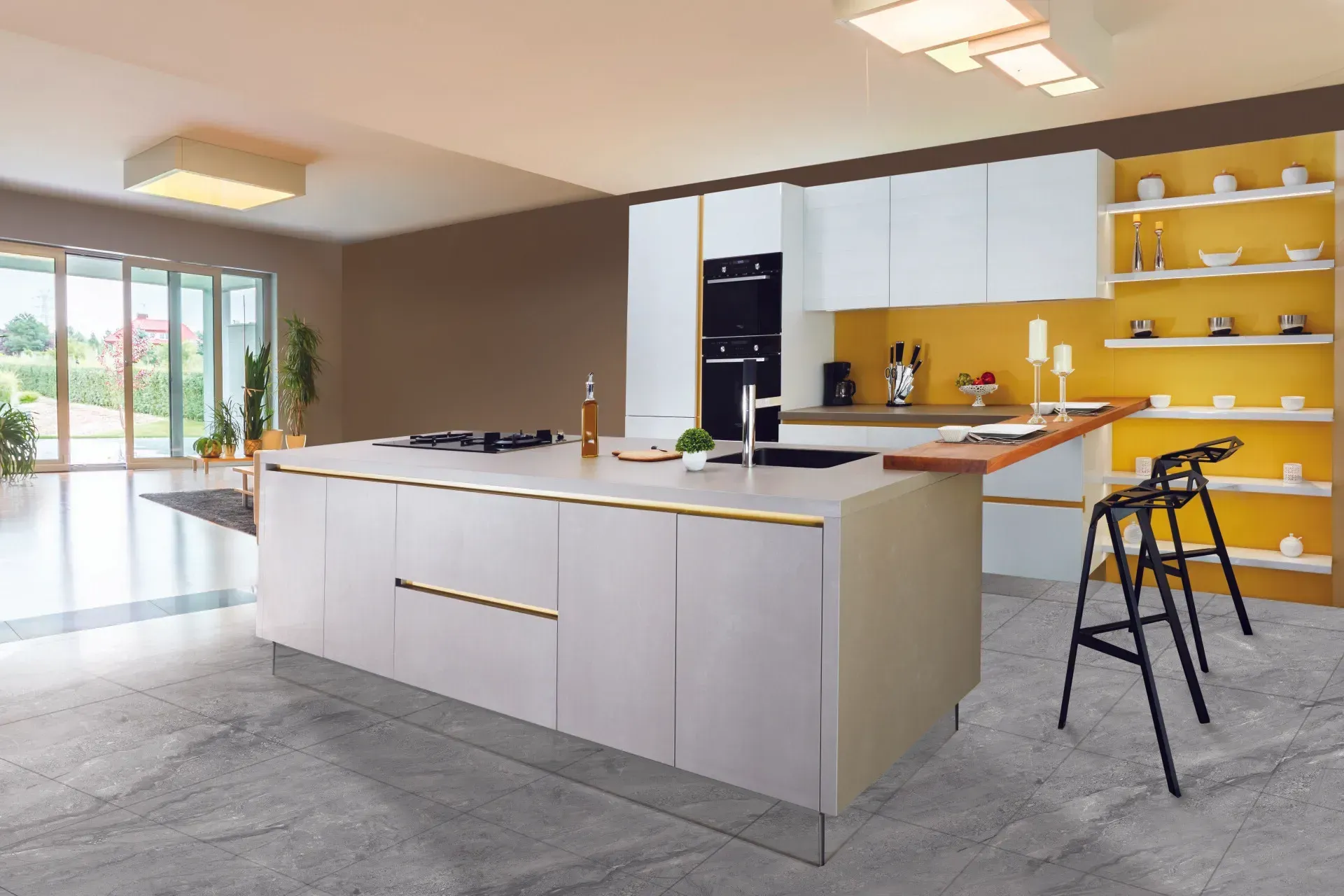 Modern kitchen with white cabinets, island, yellow accent wall, and stools.
