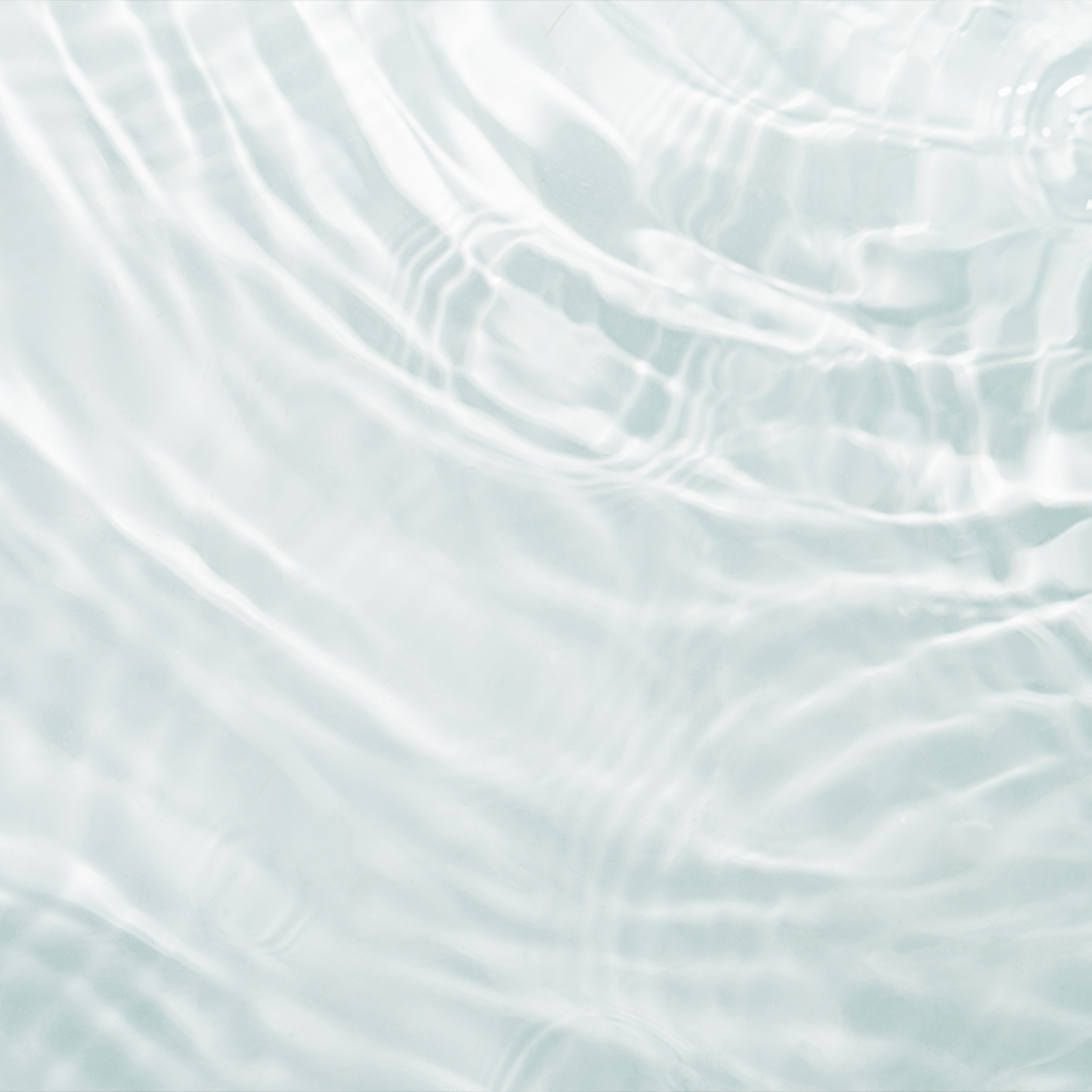 A close up of a wave in a body of water.