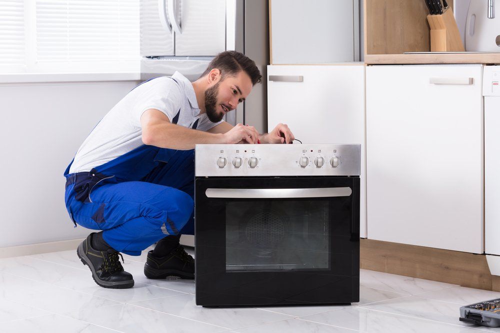 Broken Oven Function Buttons Under Repair — Elite Appliance Services in Boat Harbour, NSW