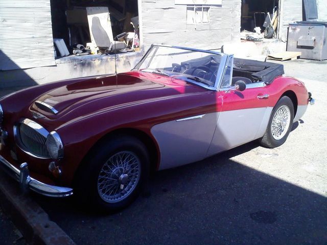 Red Vintage Car in Upholstery Store - Denver, CO - Auto Trim Specialists