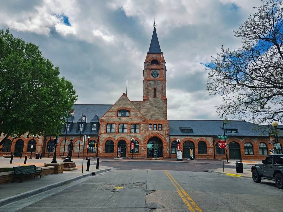A large brick building with a clock tower on top of it