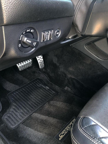 A close up of the interior of a dodge challenger srt.