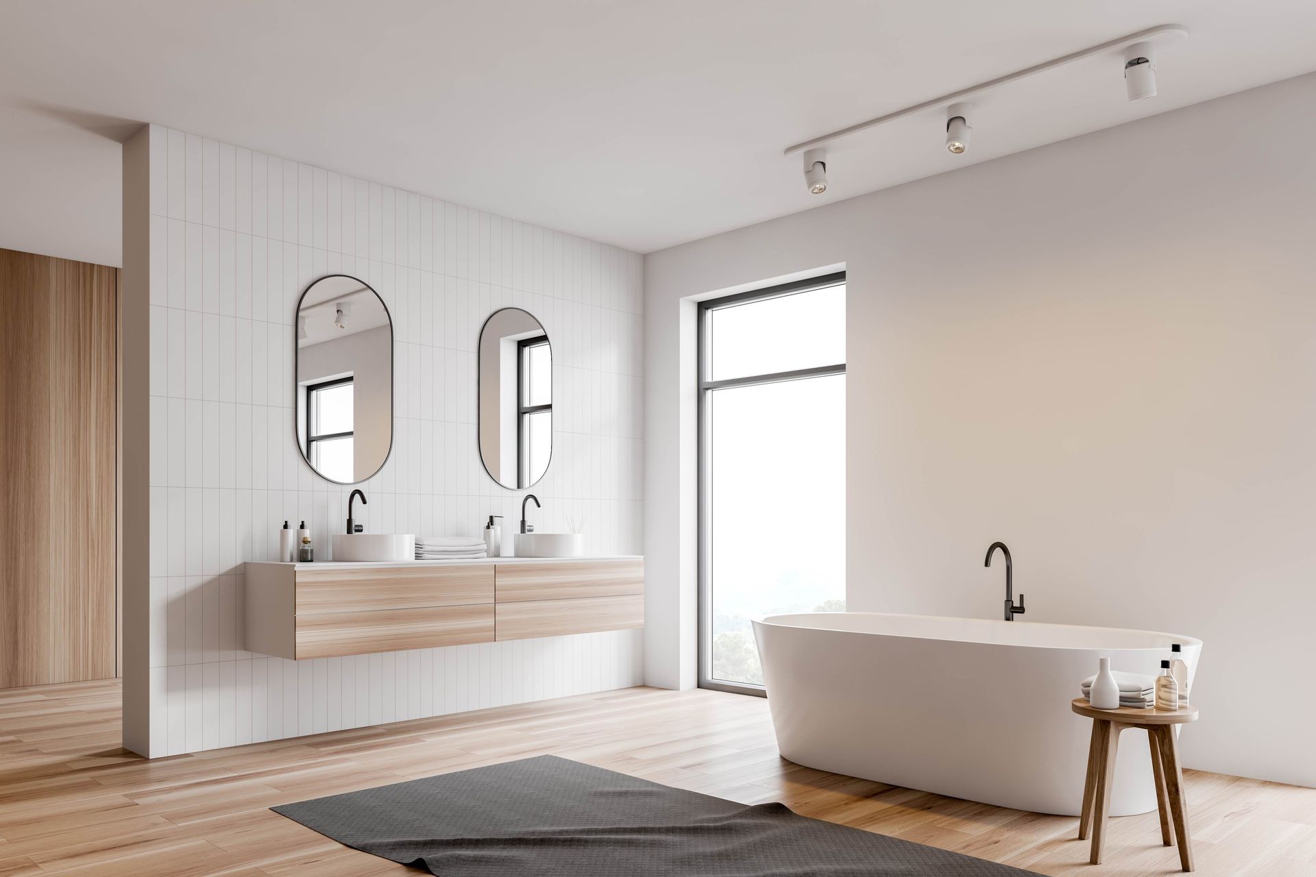 A Bathroom With a Tub, Sinks, Mirrors and a Window — Knobel Builders In Shellharbour, NSW
