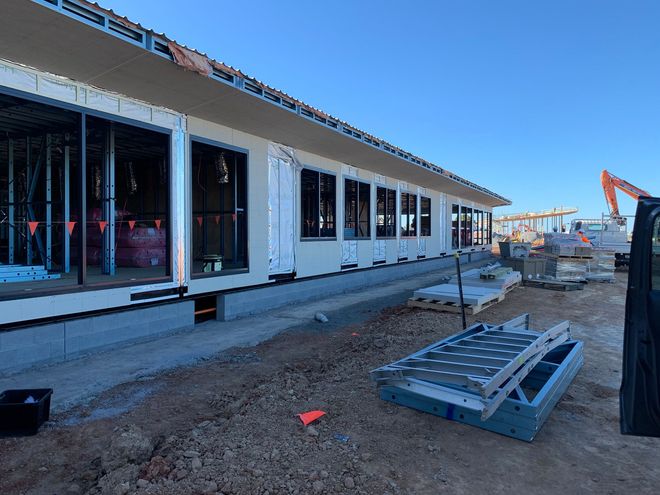 Building Under Construction With Exposed Framing — Central Coast Glass & Glazing In Umina Beach, NSW