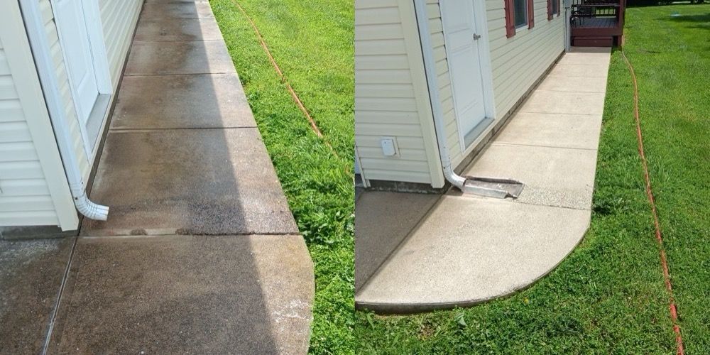 Side-by-side concrete walkway repair: dark wet slab on the left, smooth light repaired slab on the right.