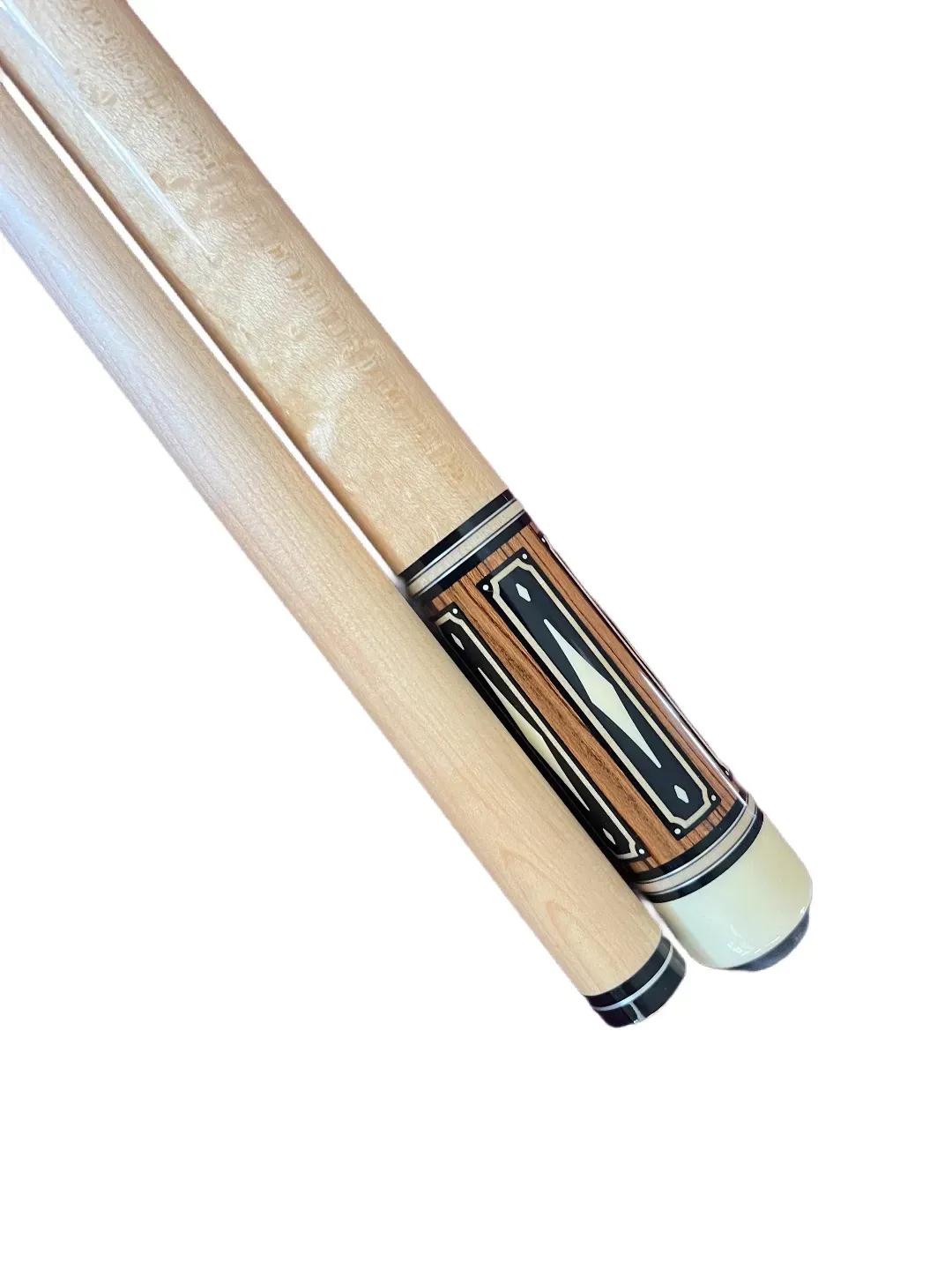 Two light wooden drumsticks with black and tan decorative grips, crossed on a white background