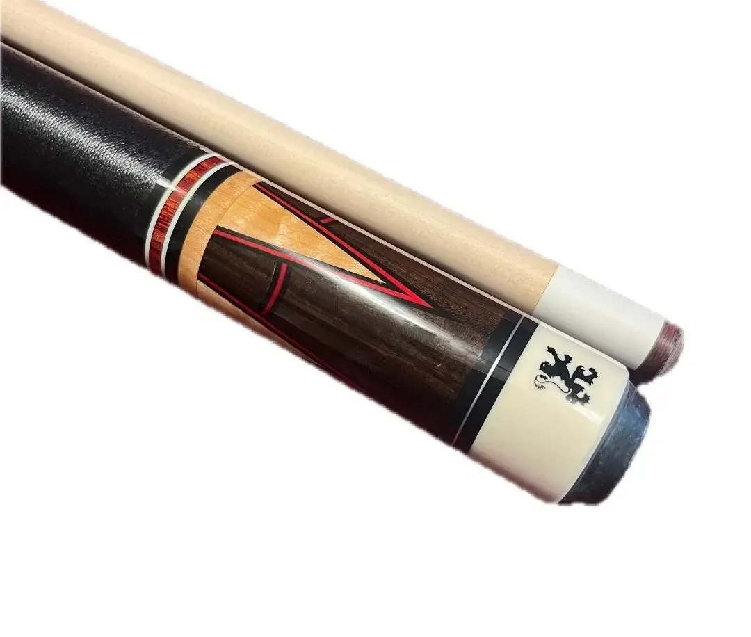 Close-up of a black and tan pool cue with red inlays and a white tip end on a white background