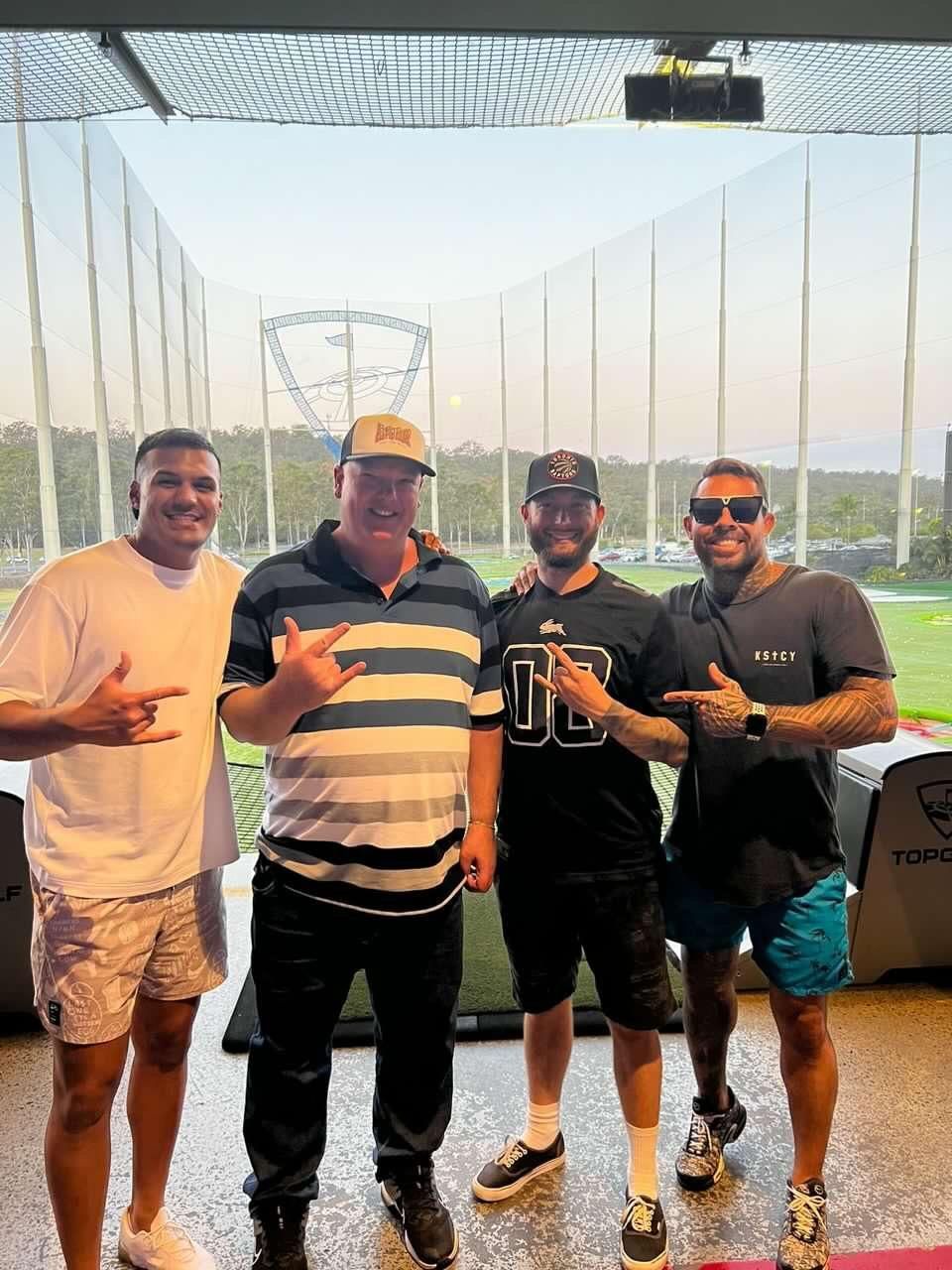 A Group of Men Are Posing for a Picture at a Golf Course — Mentally Hooked in Helensvale, QLD
