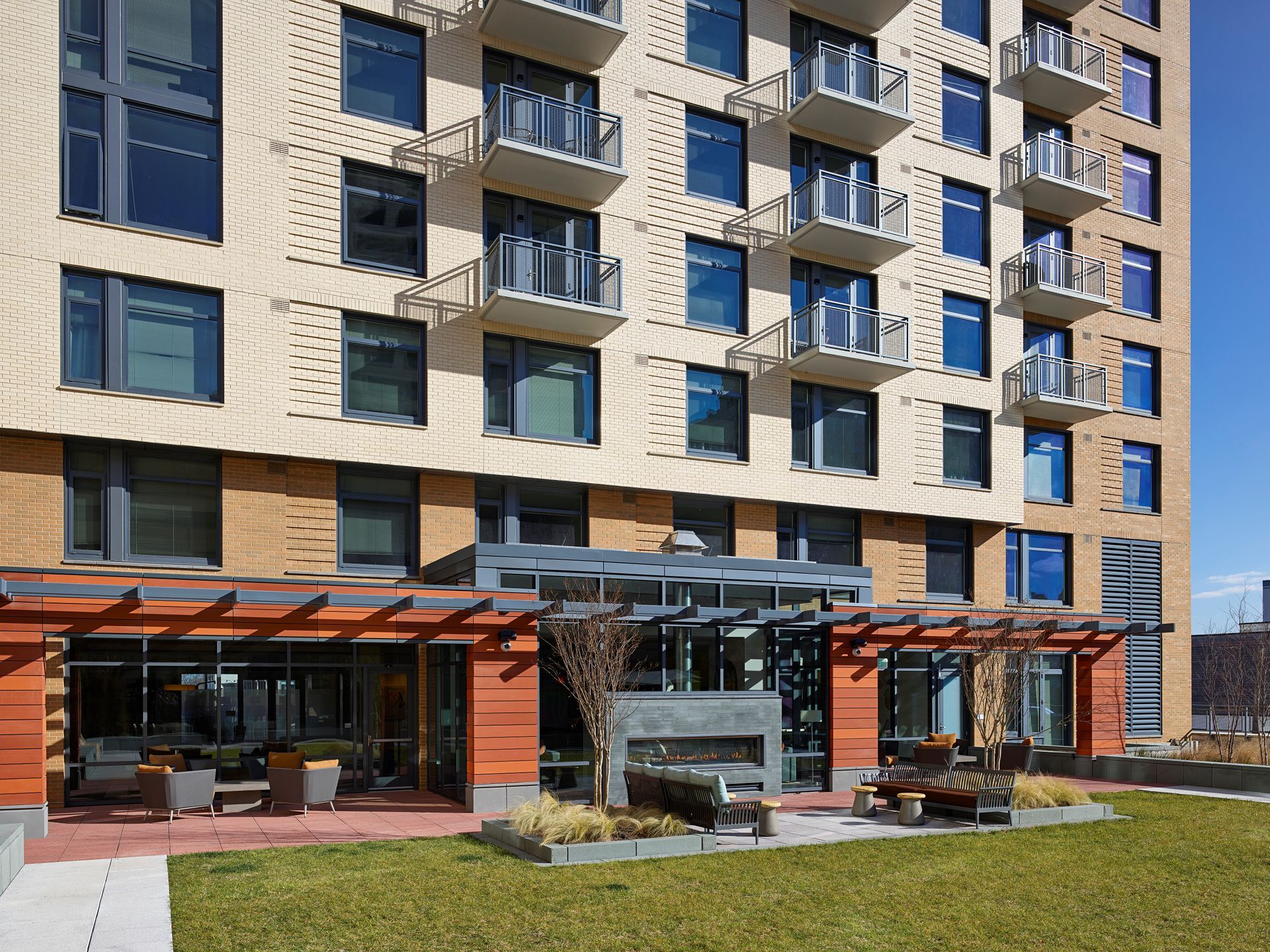 A large apartment building with a lot of windo  at Solaire 8250 Georgia in Silver Spring, MD.